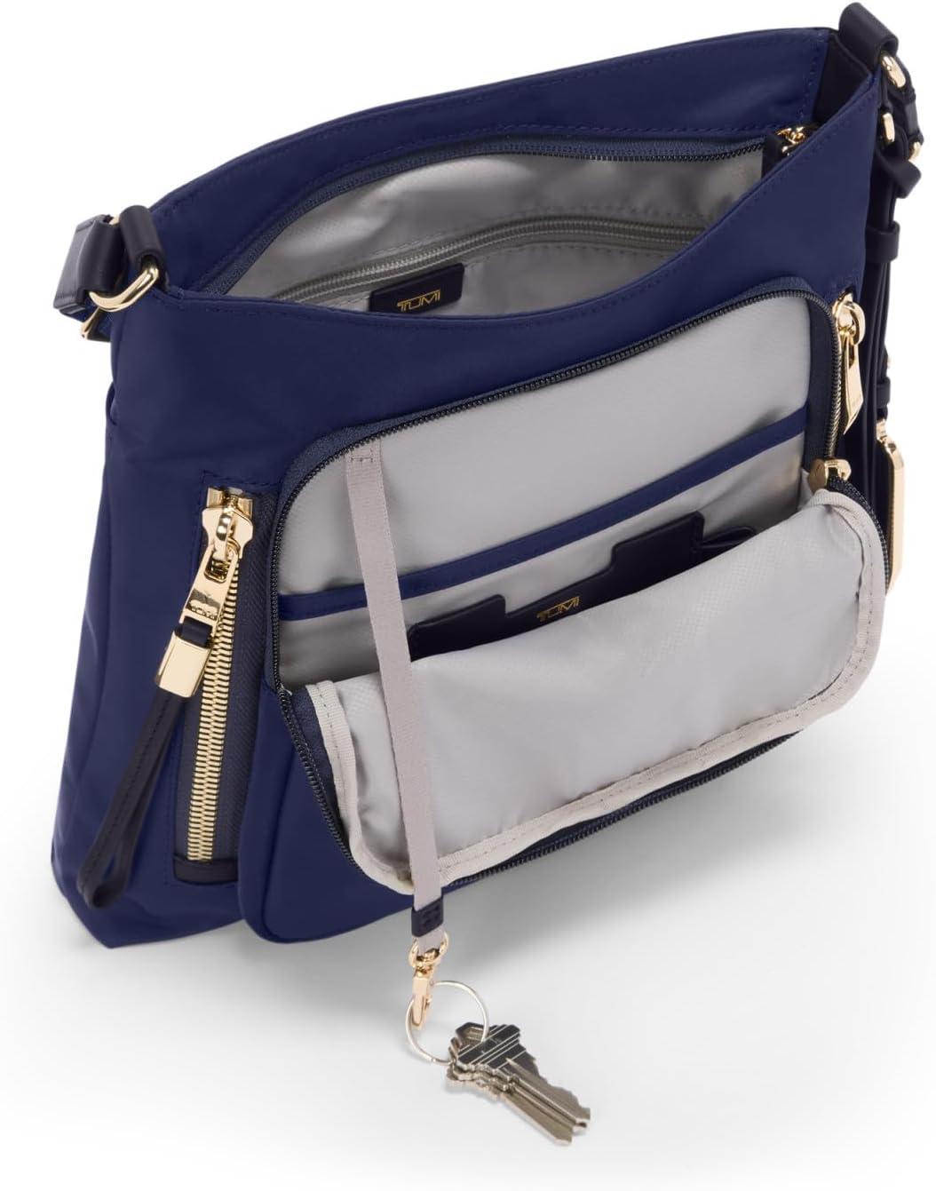 imageTUMI womens Tyler Crossbody Business Travel Bag Stain WaterResistant NylonIndigoLight Gold