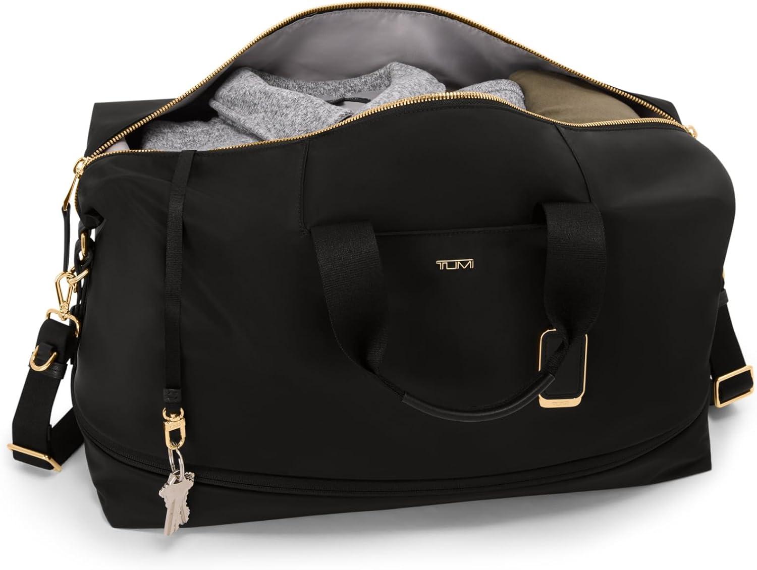 imageTUMI Voyageur Rhys Expandable Duffel Mens and Womens Weekender and Travel Bag Black amp Gold HardwareBLACKGOLD